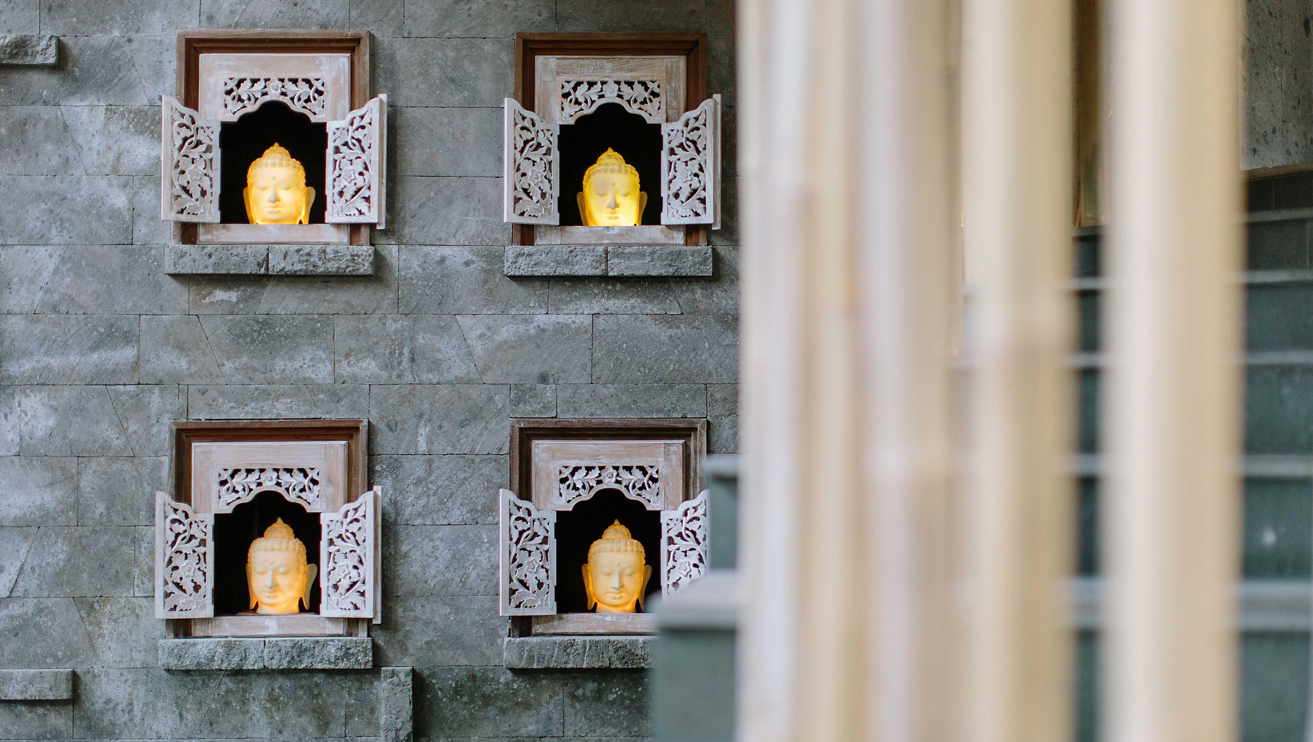 Tejaprana Resort & Spa Убуд Екстериор снимка The four faces of the Buddha