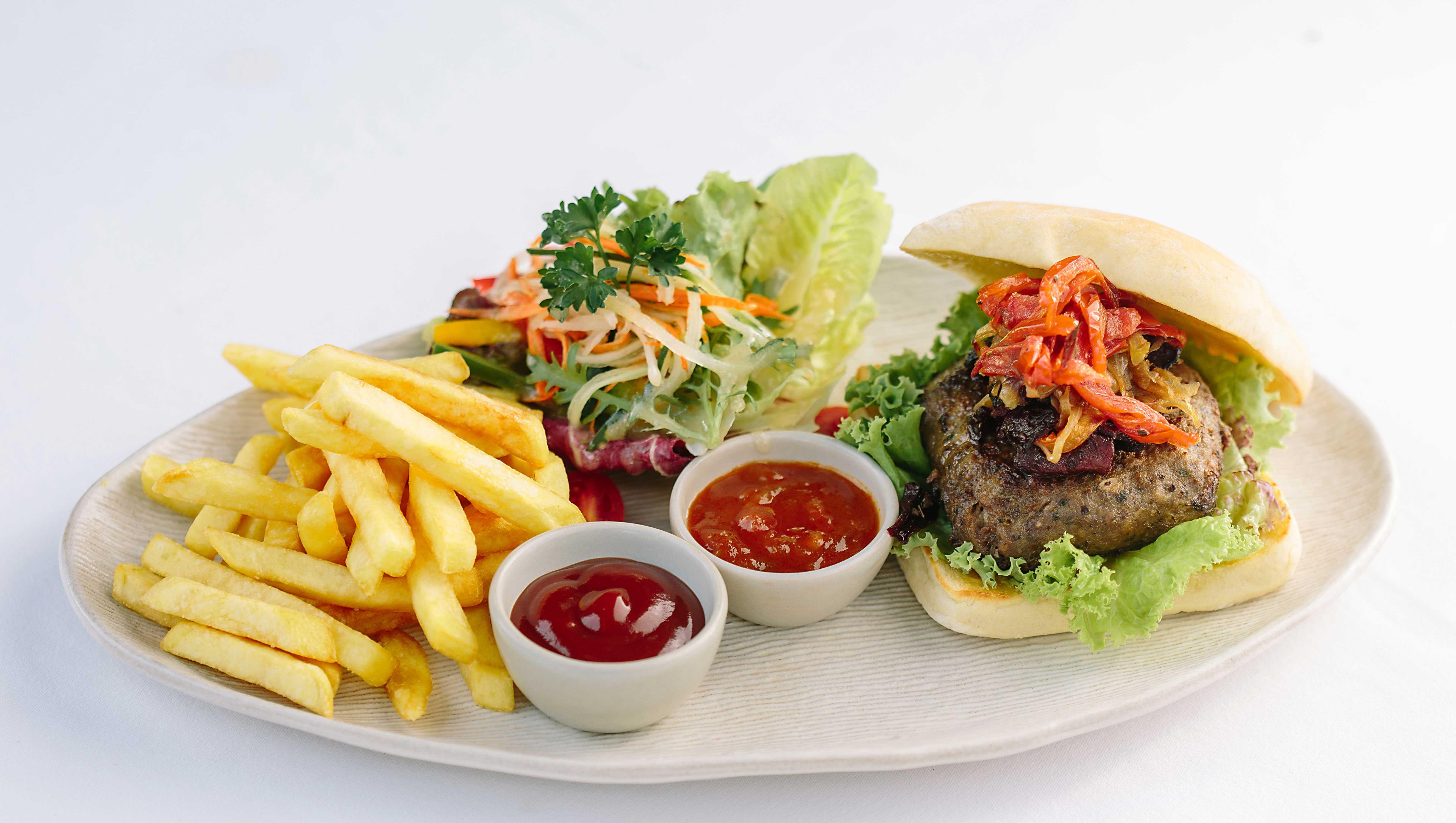 Tejaprana Resort & Spa Убуд Екстериор снимка A hamburger with chips and salad